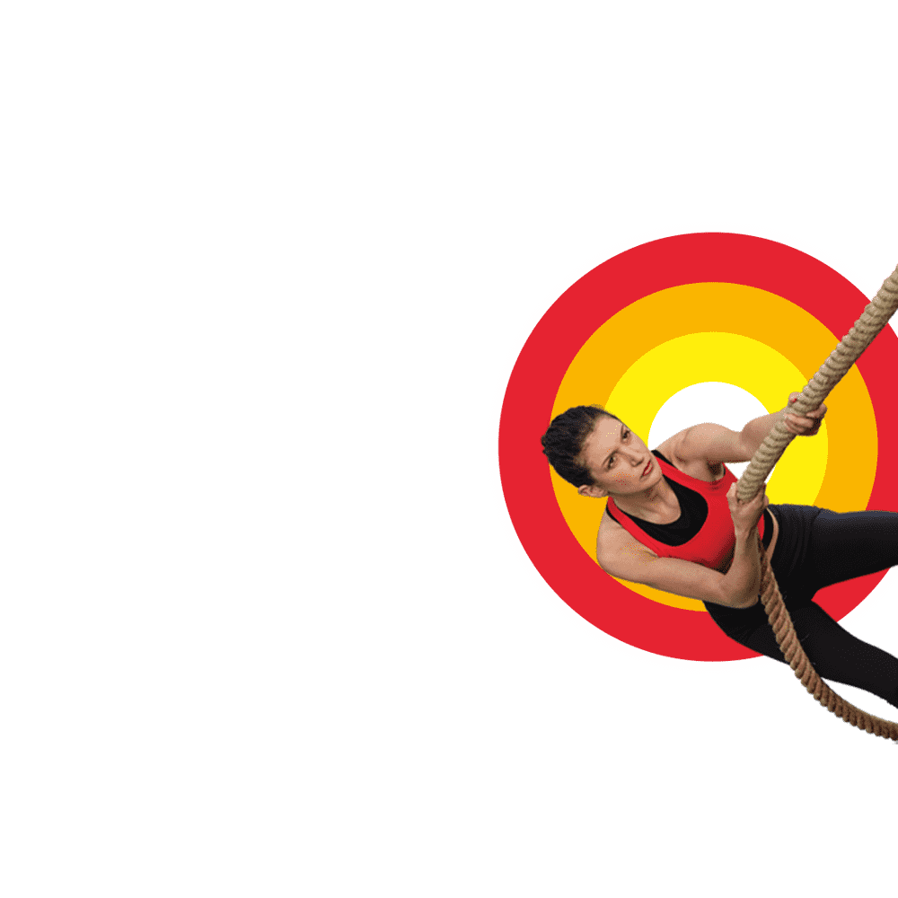 illustration of a male gymnast doing aerial acrobatic trick set inside shield crest on isolated background done in retro style